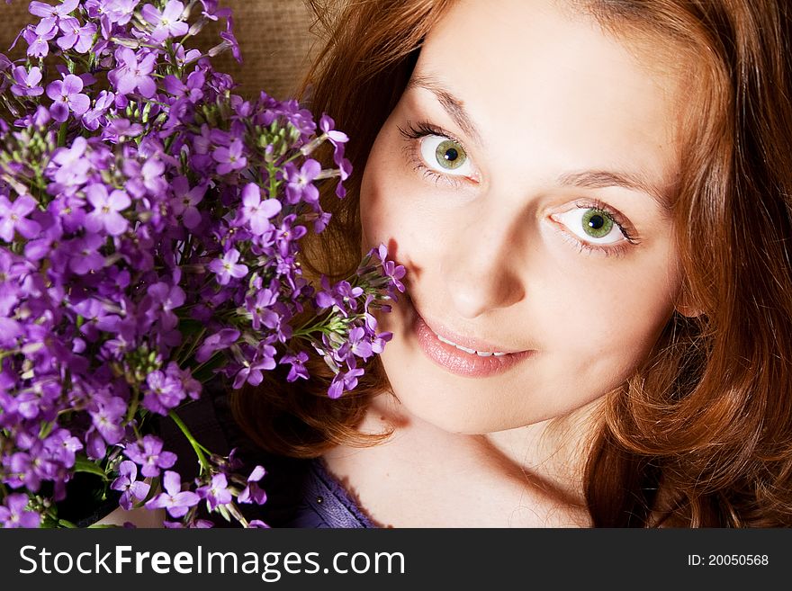 Portrait of beautiful woman in fairy flowers
