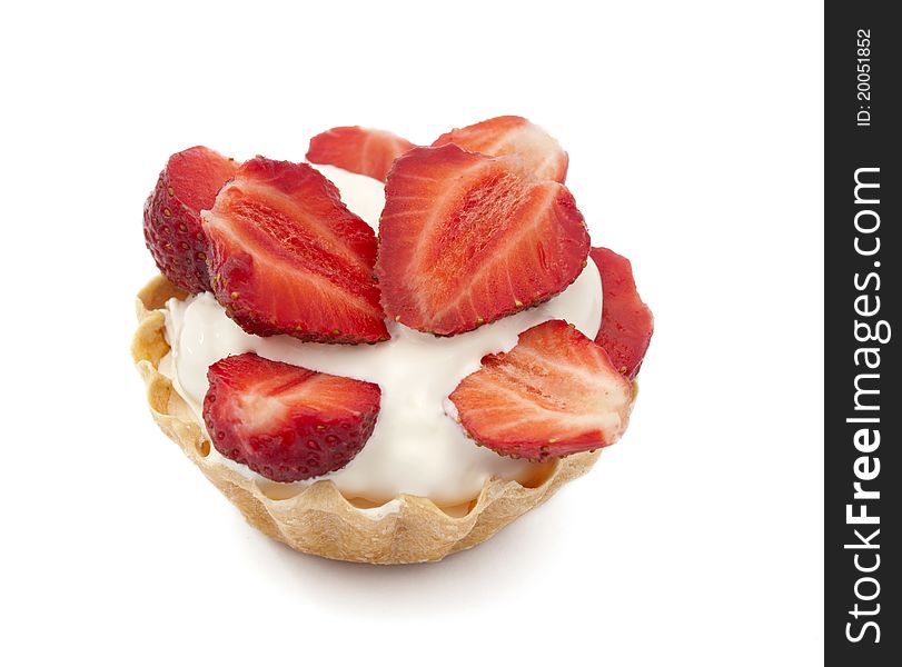 Strawberries and cream in a basket on a white background