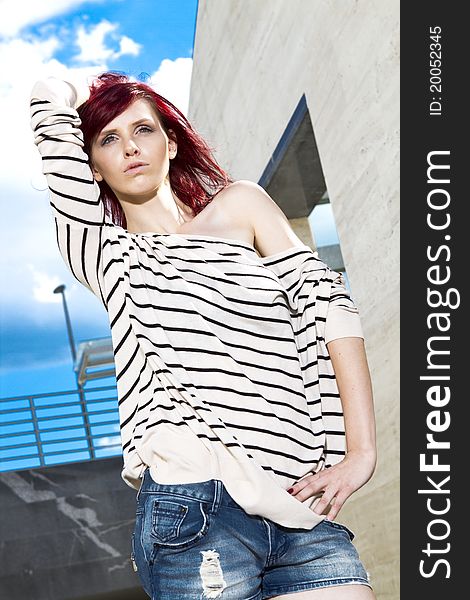 Young girl posing on a staircase