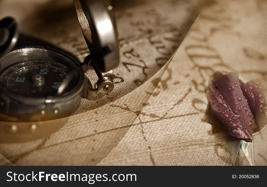 Travel back to ancient compass, map and a rosebud. Travel back to ancient compass, map and a rosebud