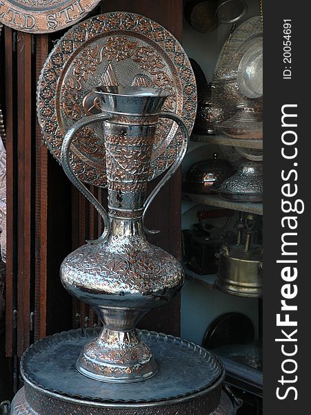 It's an ancient copper vase. It's a Anatolian decorative object.