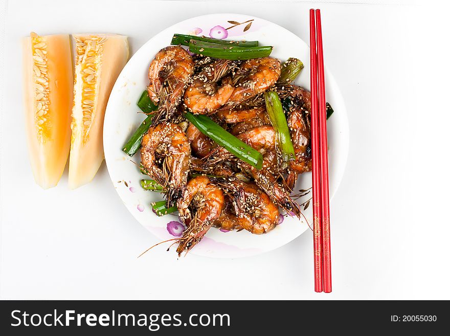 Chinese food,fried shrimp and some fruit