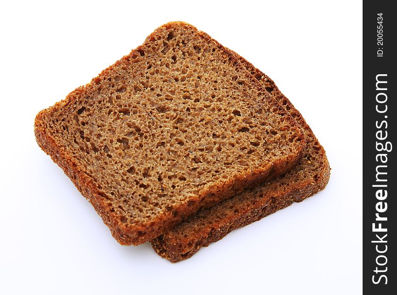 Slices of rye bread over white background