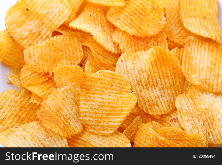 Image of crisp corrugated potato chips background