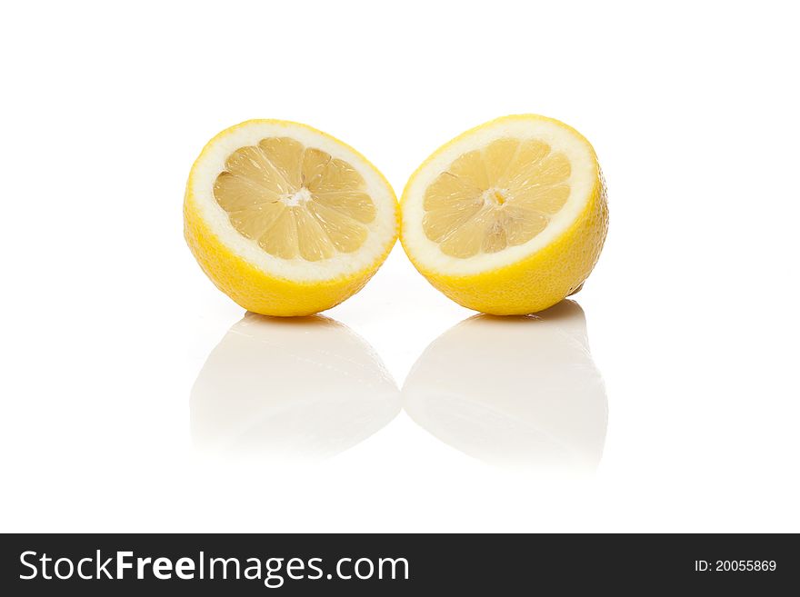 A fresh yellow lemon that is cut