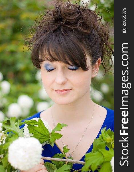 Young girl with nice make-up and closed eyes outdoors. Young girl with nice make-up and closed eyes outdoors