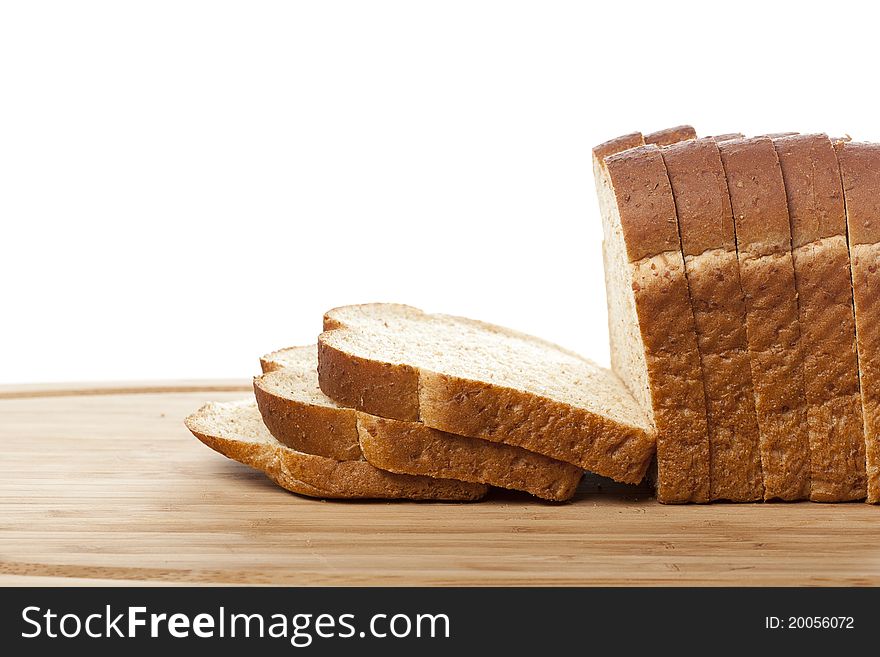 Slices of wheat bread against a white background