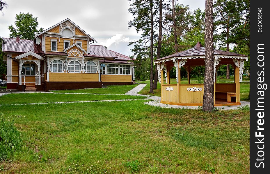 Old house and garden house in forest