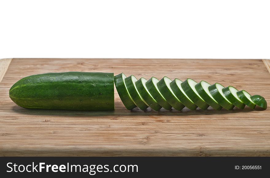 Sliced Cucumber Horizontal On Cutting Board