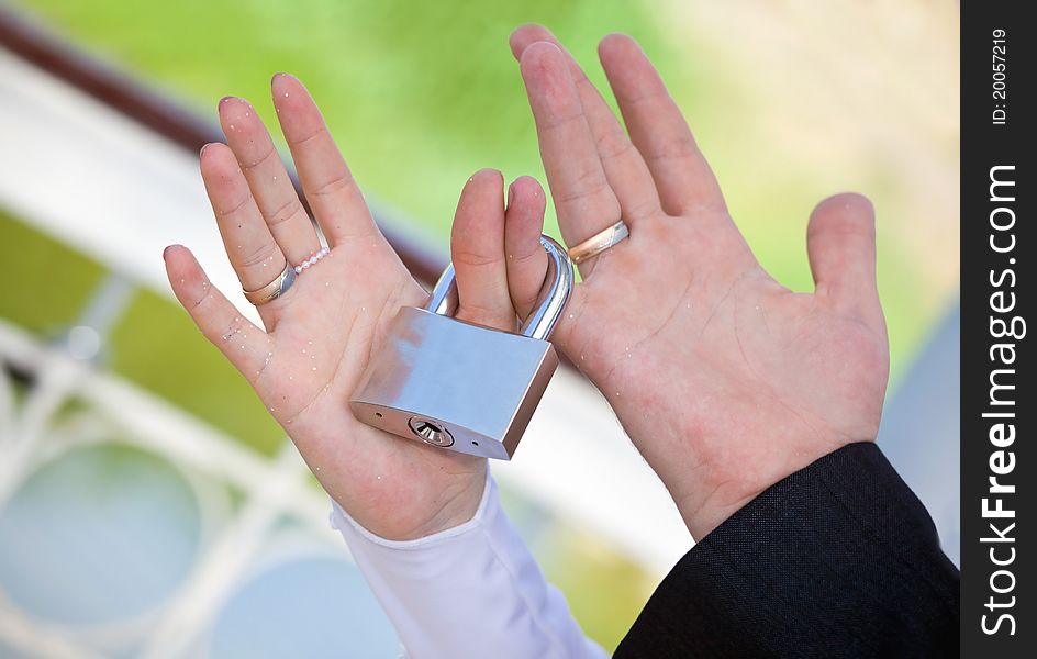 Newly-married couple has control over the lock. Newly-married couple has control over the lock