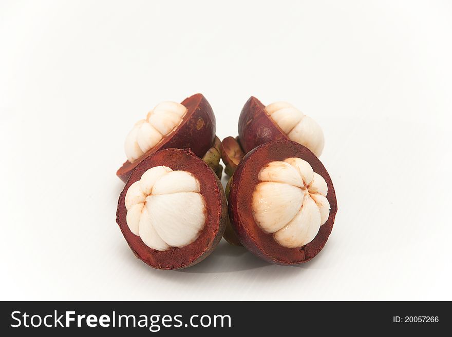 Mangosteen on white isolate.,it is one of Thai fruit and it is queen of fruit