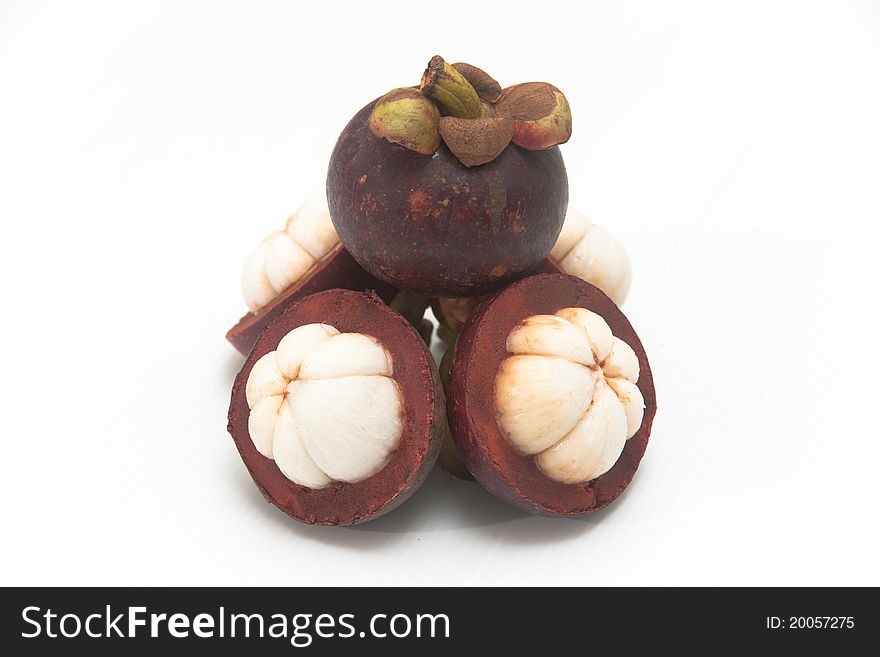 Mangosteen on white isolate.,it is one of Thai fruit and it is queen of fruit