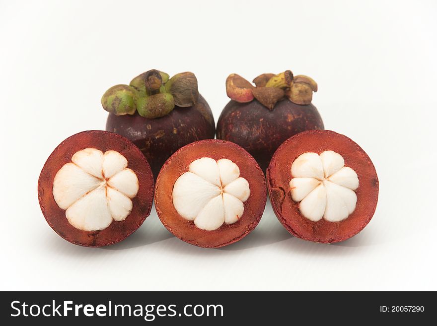 Mangosteen on white isolate.,it is one of Thai fruit and it is queen of fruit