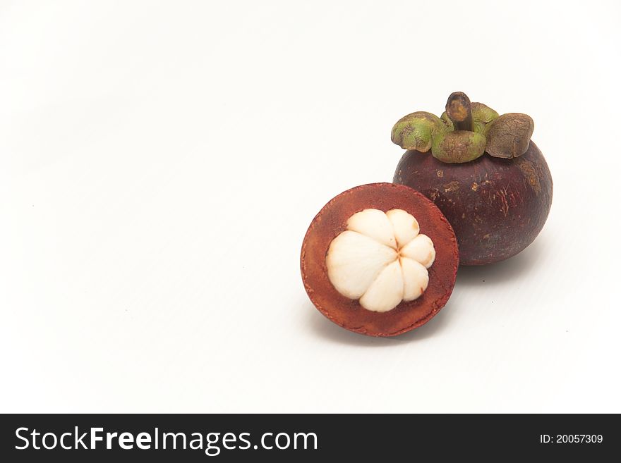 Mangosteen on white isolate.,it is one of Thai fruit and it is queen of fruit