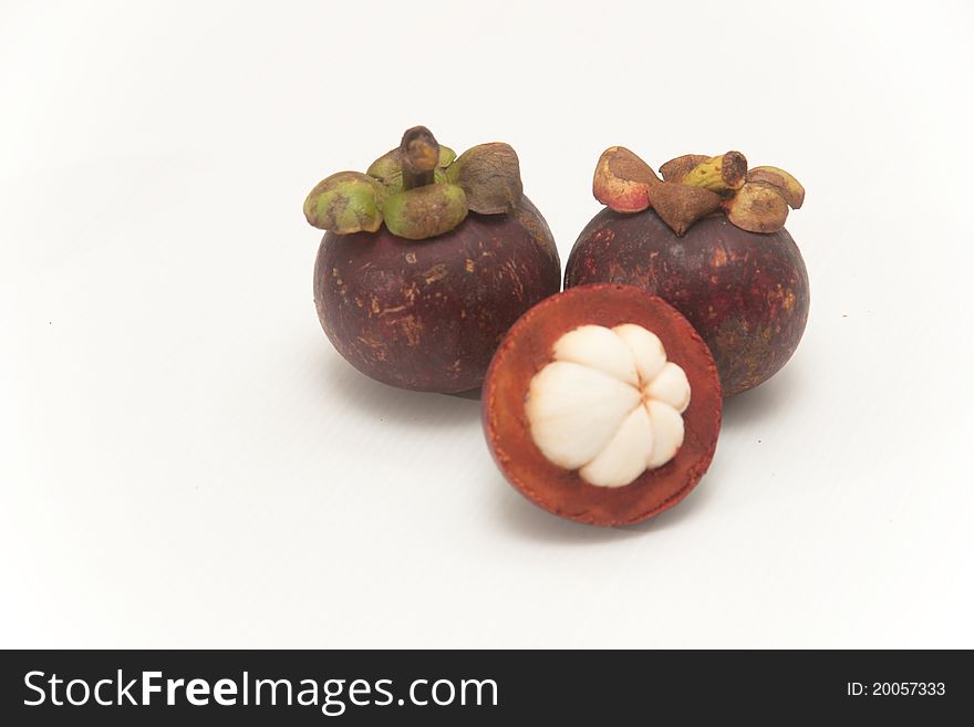 Mangosteen on white isolate.,it is one of Thai fruit and it is queen of fruit