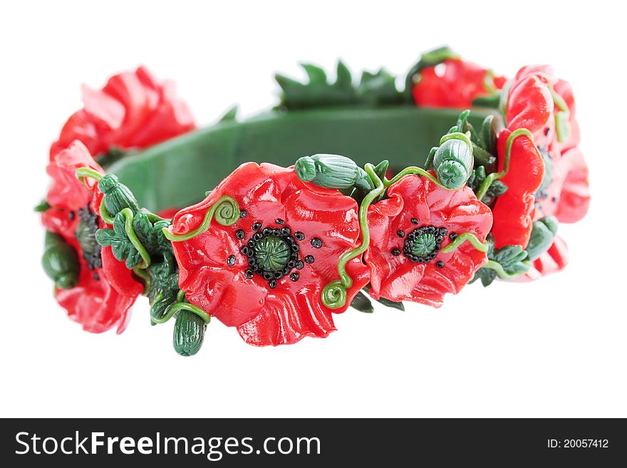 Plastic bracelet with the flowers of the poppy. Plastic bracelet with the flowers of the poppy