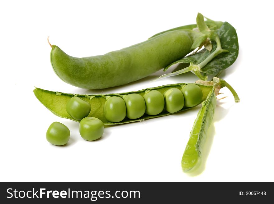 Green peas isolated on white background