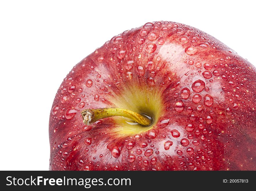 A fresh red delicious apple close up. A fresh red delicious apple close up