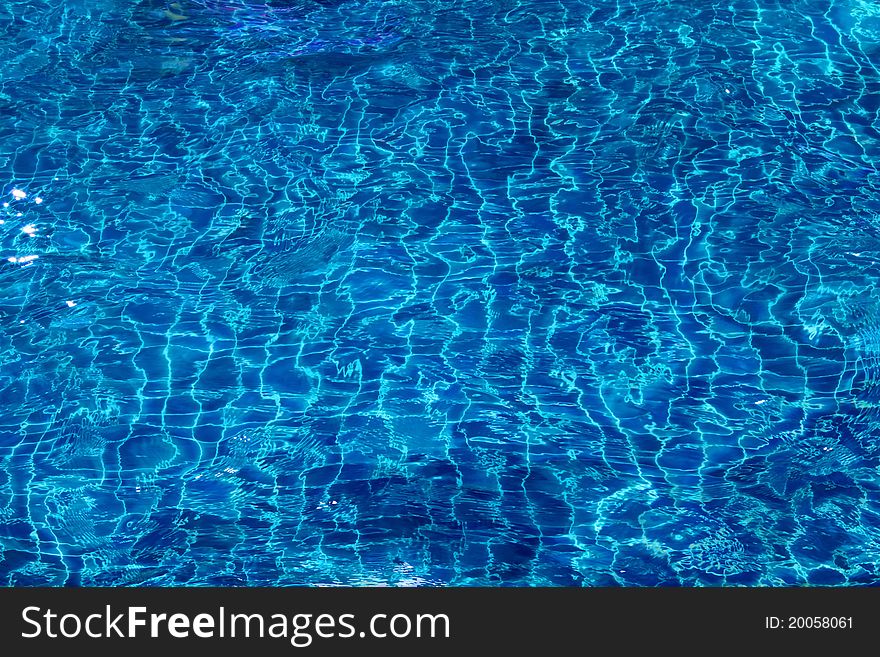 View of nice blue swimming pool water surface