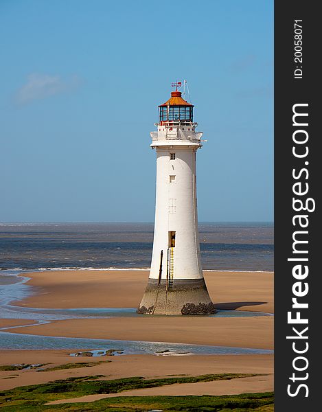 Historic lighthouse guards the coastline along the River Mersey,England. Historic lighthouse guards the coastline along the River Mersey,England