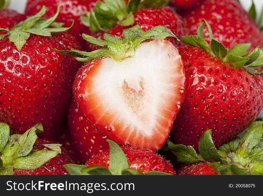 A close up group of fresh red strawberries