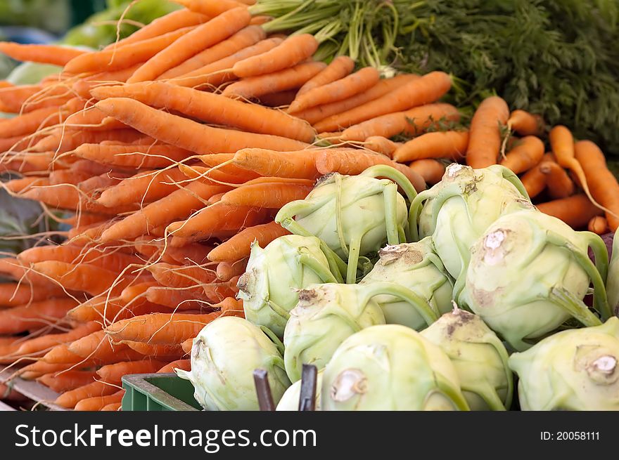 Fresh Carrot And Kohlrabi Cabbage At The Market. Fresh Carrot And Kohlrabi Cabbage At The Market