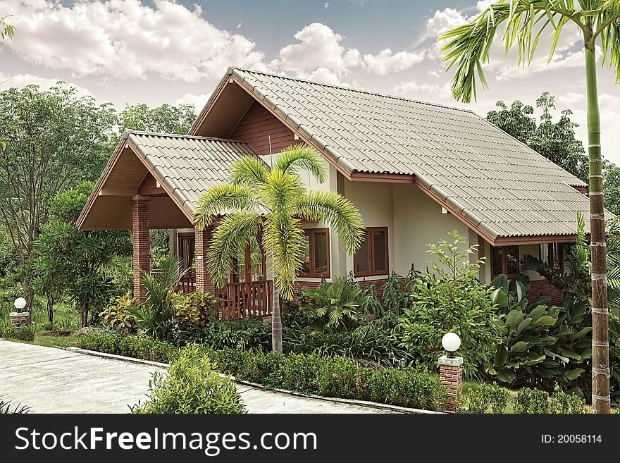 View of nice stylish summer villa in tropic environment. View of nice stylish summer villa in tropic environment