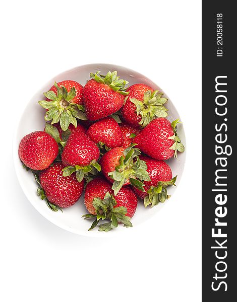 Fresh red strawberries against a white background