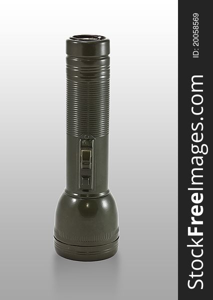 Flashlight isolated on the grey background