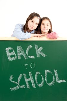 Two Girls With Blackboard Stock Images Two Girls With Blackboard Stock Images