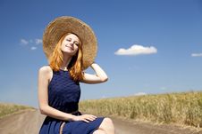 Girl With Suitcase At Country Road. Stock Images Girl With Suitcase At Country Road. Stock Images
