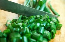Spring Onions Cutting With Knife Royalty Free Stock Photo