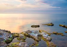 Sea And Rock At The Sunset. Stock Photo Sea And Rock At The Sunset. Stock Photo