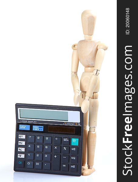 Wooden mannequin with calculator over white background. Wooden mannequin with calculator over white background.