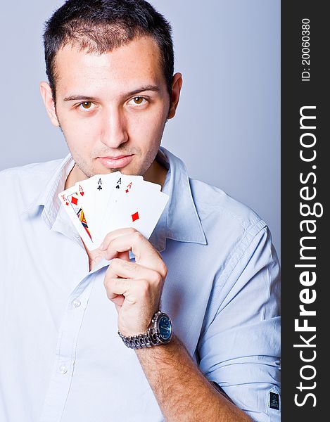 Poker Player With Four Aces And A King