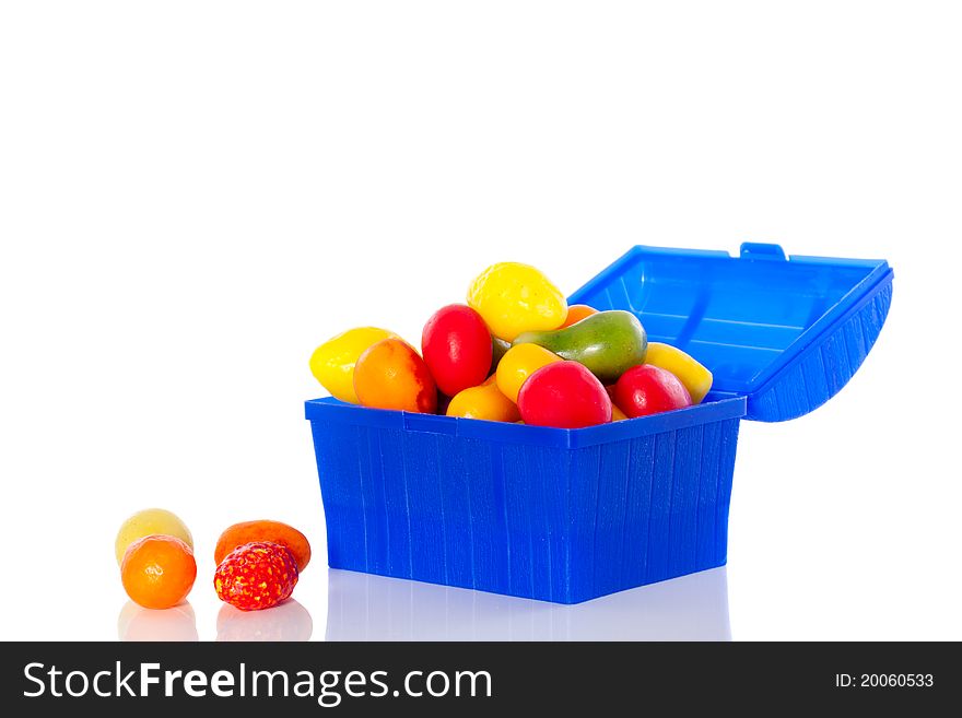 Old Dutch candy in an open plastic tray isolated over white background. Old Dutch candy in an open plastic tray isolated over white background