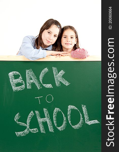 Two girls with blackboard