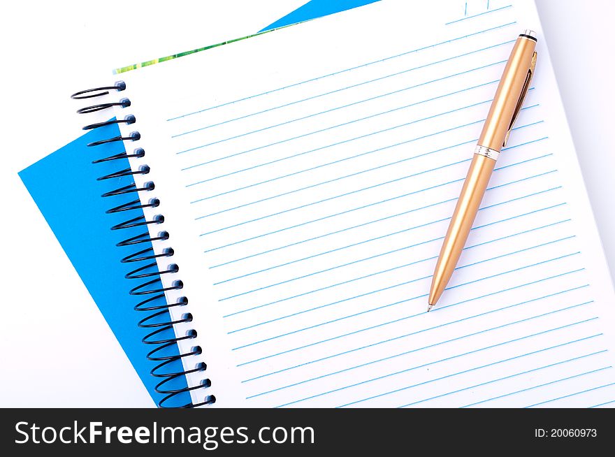 copybook and pen on white background. copybook and pen on white background