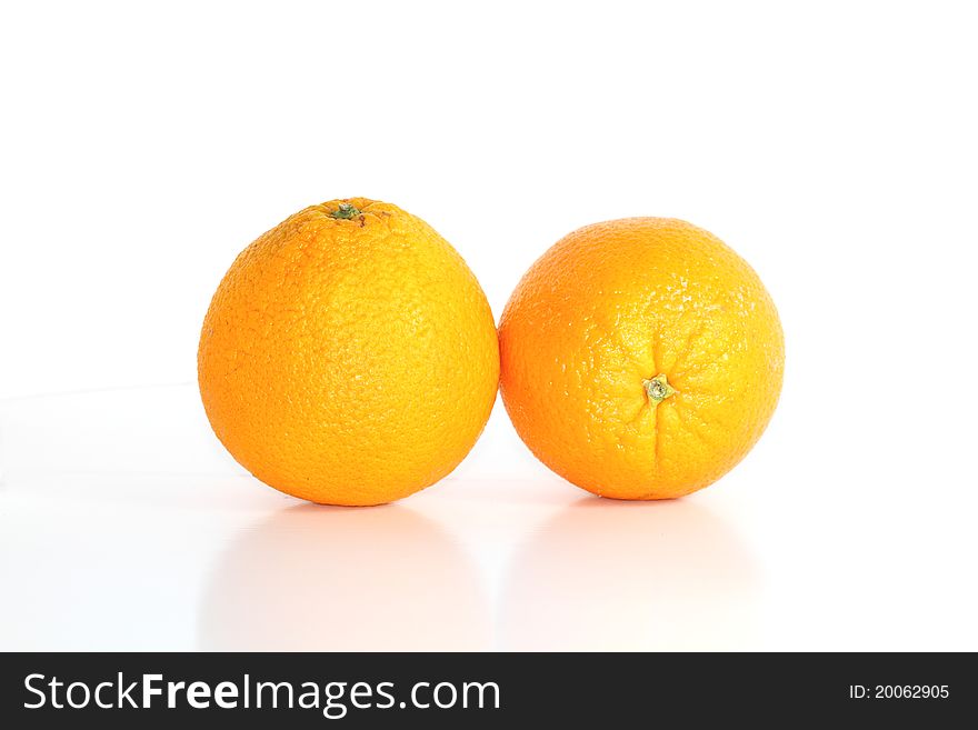 Two oranges isolated on white