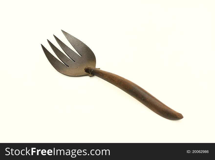 Wooden fork , isolated on white background