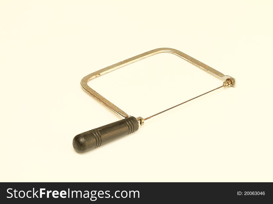 Coping saw on white background