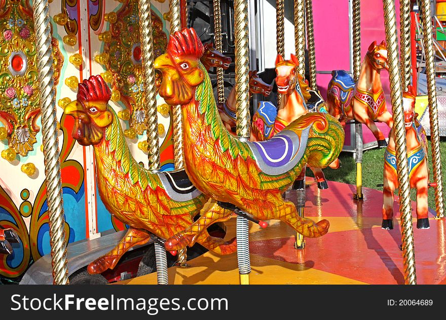 A Fun Fair Carousel Ride with Chickens and Horses. A Fun Fair Carousel Ride with Chickens and Horses.