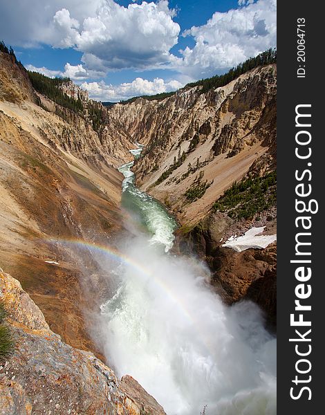 Rainbow over the waterfall in Yellowstone