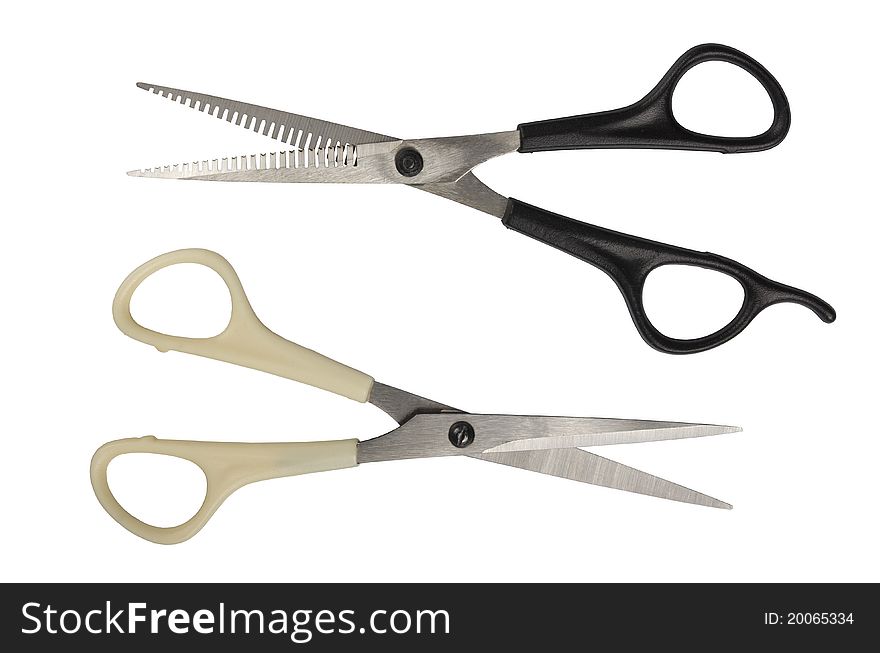 Hairdressing scissors. Isolated on a white background.