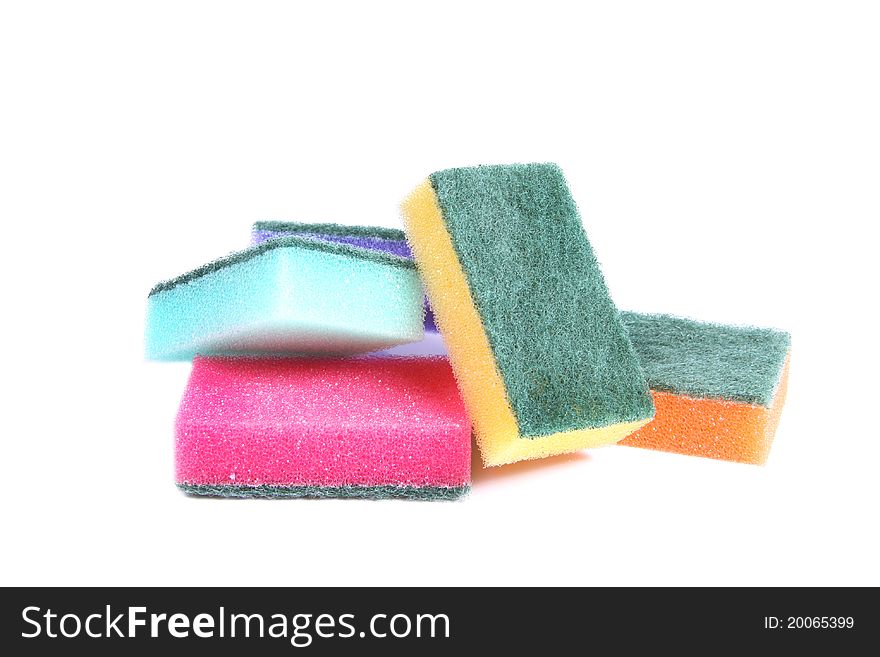 Colorful sponges isolated on white background