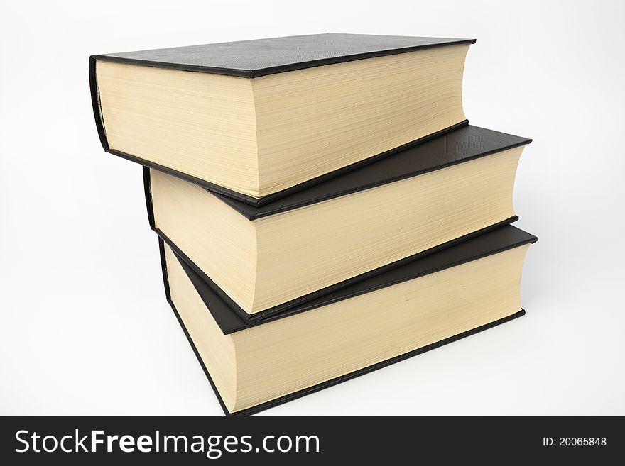 Pile of closed books on a white background. Pile of closed books on a white background