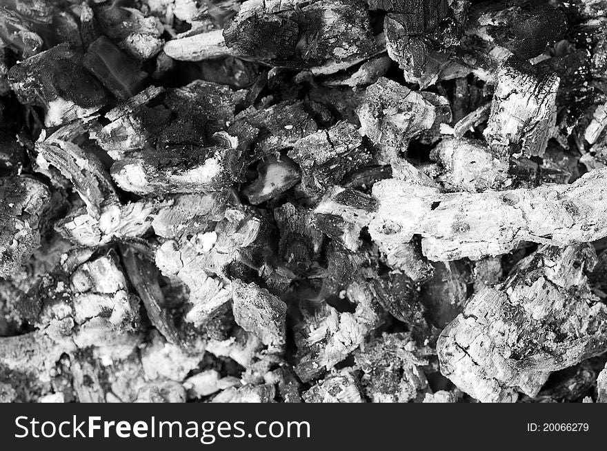 Pile of grey ashes from the burned wood