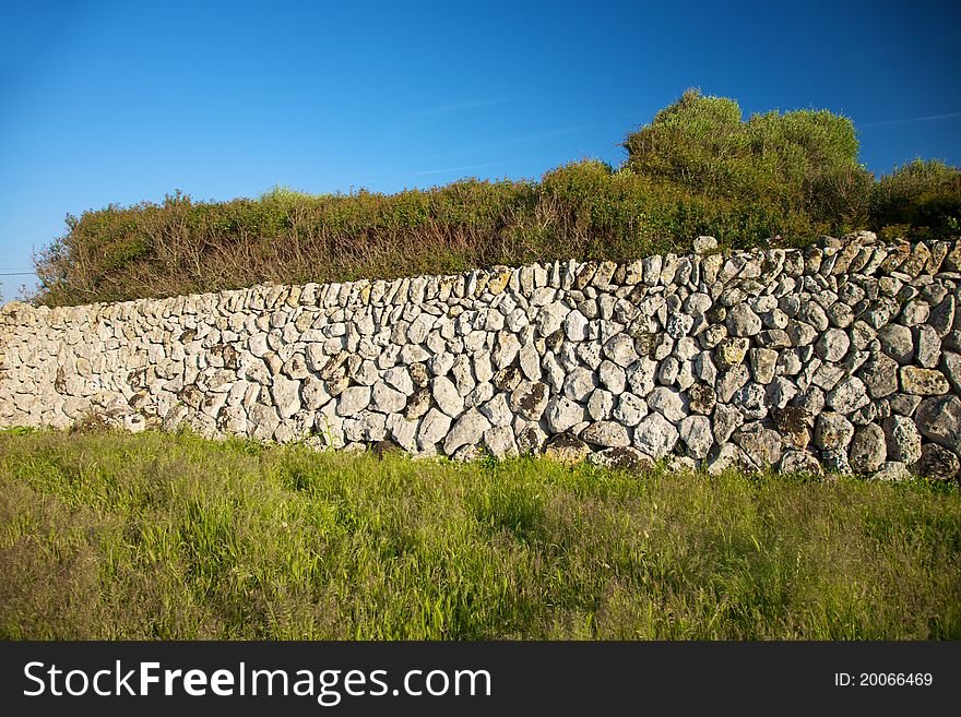 Stones wall at Menorca Island in Spain. Stones wall at Menorca Island in Spain
