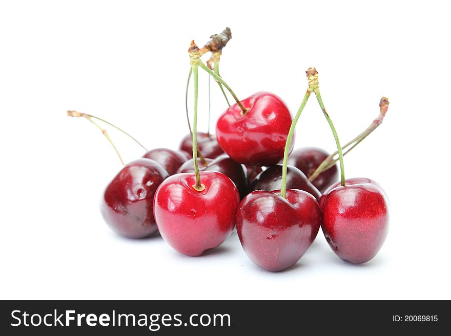 Sweet red cherries isolated on white background