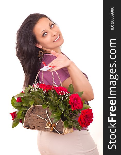 Beautiful young woman caring flowers